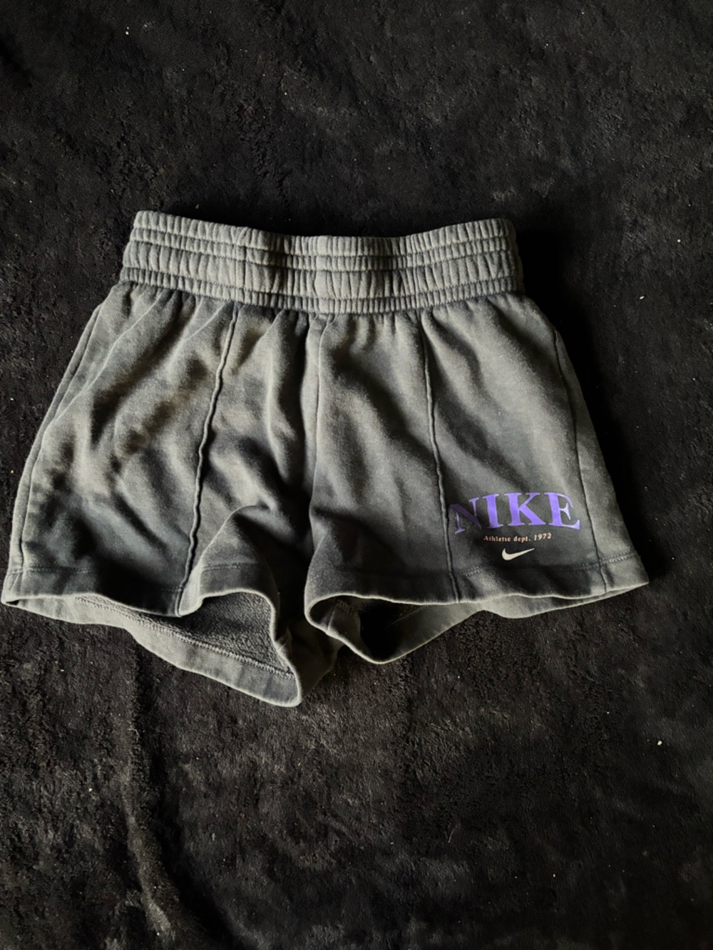 Kids Nike Black Shorts with Purple Nike Script and White Swoosh